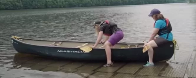 getting into the canoe